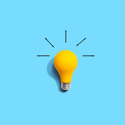 lighbulb in front of bright blue background